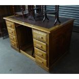 A MID-CENTURY MAHOGANY TWIN PEDESTAL DESK