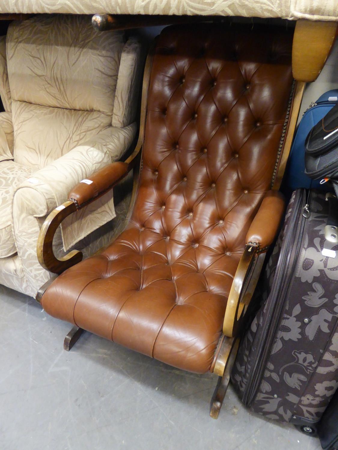 A REPRODUCTION BROWN LEATHER UPHOLSTERED REGENCY  REVIVAL CHAIR (BOTH BACK LEGS HAVING BEEN