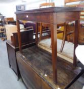 AN ANTIQUE INLAID MAHOGANY FOLD OVER TEA TABLE