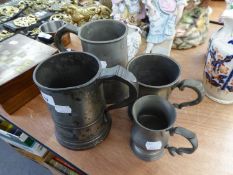 TWO ANTIQUE PERWTER QUART TANKARDS, AN ANTIQUE PEWTER PINT TANKARD AND A PEWTER HALF PINT TANKARD (