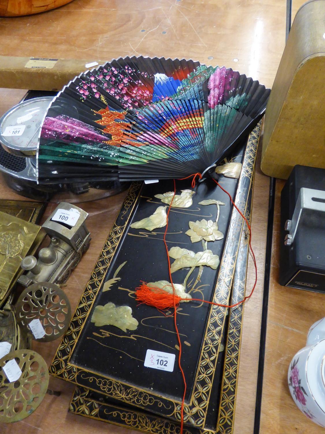 A PAIR OF ORIENTAL BLACK LACQUER NARROW OBLONG WALL PANELS, DECORATED IN MOTHER O'PEARL WITH BIRDS