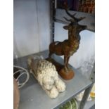 RECONSTITUTED STONE MODEL OF 'CANOVA LION' 12" LONG AND A CAST IRON MODEL OF A STAG (ONE ANTLER