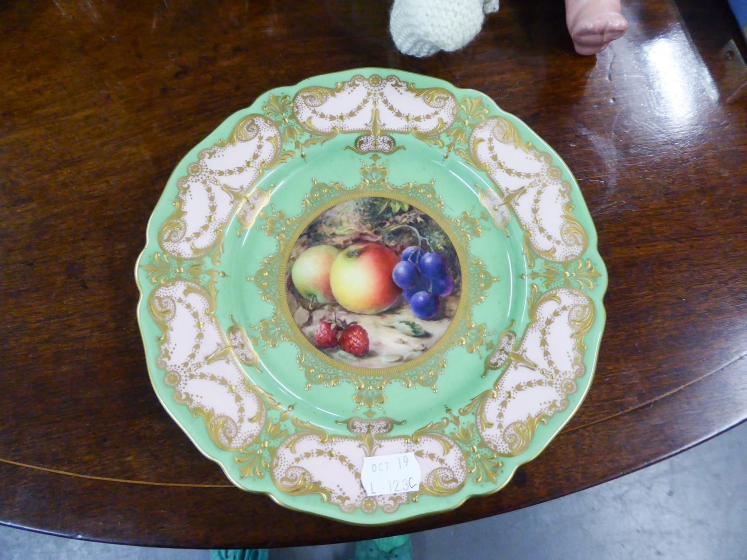 EARLY TWENTIETH CENTURY FRUIT PAINTED ROYAL WORCESTER CHIN PLATE BY SEBRIGHT, with apple green and