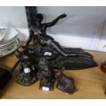 A MODERN BRONZED RESIN NUDE RECLINING FEMALE FIGURE AND TWO SMALL ORNAMENTS, 'THE KISS' AND AN '