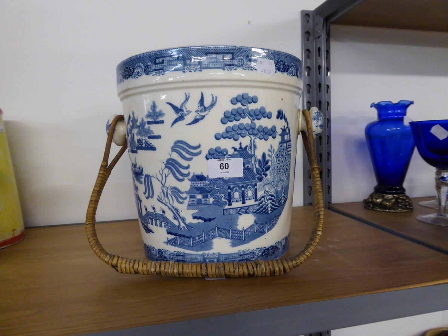 POTTERY WILLOW PATTERN SLOPS PAIL WITH CANE BOUND SWING HANDLE