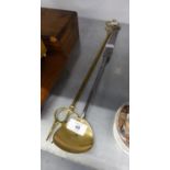 AN ANTIQUE LONG HANDLED STEEL LADLE WITH ROUND  BRASS BOWL AND AN OLD BRASS TOASTING FORK