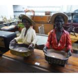 TWO PAINTED PLASTER HALF FIGURES OF BLACK MEN HOLDING BASKETS, one a/f, 16? high, (2)