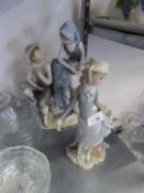 A LARGE NAO, SPANISH PORCELAIN GROUP, YOUNG WOMAN AND YOUNG MAN HOLDING GRAPES, 13" HIGH, AND A