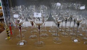 SET OF 11 GLASS TALL WINE GOBLETS, THE SLENDER DRAWN STEMS WITH RED TEAR INCLUSIONS, SET OF 11