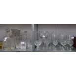 A SET OF FOUR CUT GLASS SQUARE SPIRIT DECANTERS, ANOTHER DECANTER (SOME A.F.) AND A QUANTITY OF