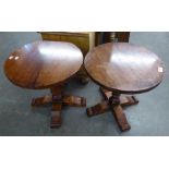 A PAIR OF OAK CIRCULAR LAMP TABLES, ON COLUMN AND QUARTETTE BASES