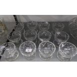 A SET OF TWELVE CUT GLASS SUNDAE DISHES ON SAUCER  SHAPED BASES