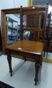 A VICTORIAN CARVED OAK HALL CHAIR WITH PANEL SEAT