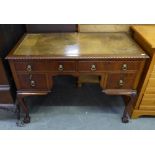 CHIPPENDALE STYLE CARVED MAHOGANY KNEEHOLE DESK WITH INLET LEATHER TOP, GADROON CARVED BORDERS, FOUR