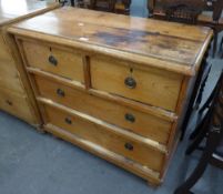 VICTORIAN PINE CHEST OF TWO SHORT AND TWO LONG DRAWERS WITH REPLACEMENT BRASS PATERAE AND RING