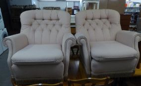 A PAIR OF VICTORIAN STYLE SEMI-WINGED BUTTON UPHOLSTERED LOUNGE CHAIRS, COVERED IN TRELLIS PATTERN