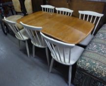 ERCOL STYLE BLONDWOOD LEAF KITCHEN TABLE AND A SET OF SIX WHITE PAINTED SINGLE DINING CHAIRS
