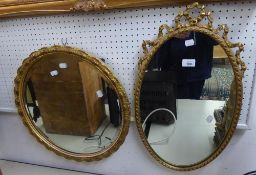 CIRCULAR GILT FRAMED WALL MIRROR AND ANOTHER WALL MIRROR IN GILT FANCY FRAME (2)