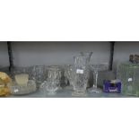 A GOOD SELECTION OF CUT AND MOULDED GLASSWARES TO INCLUDE; A BOAT SHAPED BOWL, OTHER BOWLS, A PAIR