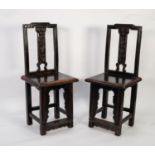 AGED PAIR OF CHINESE CARVED HARDWOOD SINGLE CHAIRS, each with moulded back and floral carved splat