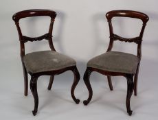 SET OF SIX VICTORIAN CARVED ROSEWOOD SINGLE DINING CHAIRS, each with a curved shoulder board and