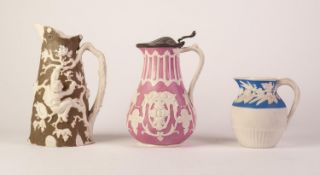 THREE RELIEF MOULDED WHITE STONEWARE JUGS WITH ENAMELLED BACKGROUNDS, comprising: T.J.& J. MAYER?