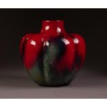 CHARLES NOKE AND FRED MOORE, ROYAL DOULTON SUNG GLAZED POTTERY VASE, of organic lobated form with