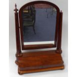 VICTORIAN FIGURED MAHOGANY LARGE TOILET MIRROR, of typical form with arch topped plate, tapering