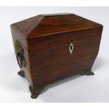 EARLY NINETEENTH CENTURY LINE INLAID ROSEWOOD TEA CADDY, of sarcophagus form with twin lidded