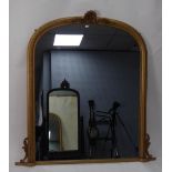 LARGE VICTORIAN STYLE MOULDED GILT GESSO OVERMANTLE MIRROR, the plate in an arch topped moulded