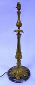 ROCOCO STYLE ORMOLU TABLE LAMP, with floral embossed slender baluster column and pierced base,