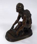 RON LIOD SAUVAGE, PATINATED BRONZE SEMI NAKED FIGURE OF THE ROMAN GOD SATURN, modelled kneeling