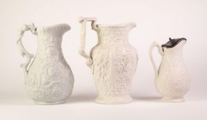 THREE WHITE GLAZED FOLIATE MOULDED POTTERY JUGS, comprising: A PROBABLY RIDGWAY & ABINGTON ?HARVEST?