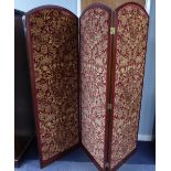 MAHOGANY THREE FOLD SCREEN, each panel arch topped and lined to one side with William Morris style