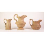 THREE BUFF GLAZED FOLIATE MOULDED POTTERY JUGS, comprising: a CHARLES MEIGH ?ROMAN? jug, 11? (