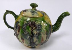 EIGHTEENTH CENTURY WHEELDON MOULDED POTTERY TEAPOT AND COVER, of bullet form with leaf moulded