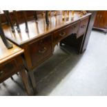 A MAHOGANY OBLONG DRESSING TABLE WITH THREE DRAWERS, ON SQUARE TAPERING LEGS (POLISH DAMAGE)