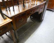 A MAHOGANY OBLONG DRESSING TABLE WITH THREE DRAWERS, ON SQUARE TAPERING LEGS (POLISH DAMAGE)