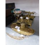 AN EMBOSSED CAST BRASS INKSTAND, AN EMBOSSED CAST BRASS INKSTAND WITH TWO INKWELLS AND A SET OF