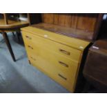 A MODERN LIGHT OAK EFFECT CHEST OF THREE LONG DRAWERS