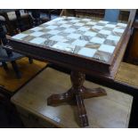 A MODERN OCCASIONAL TABLE WITH TOP SET FOR CHESS