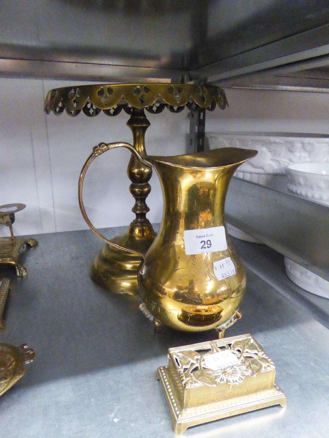 AN ANTIQUE BRASS CIRCULAR PEDESTAL KETTLE STAND; PIERCED BRASS OBLONG BOX AND AN INDIAN ENGRAVED