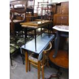 A FORMICA TOPPED KITCHEN FALL-LEAF TABLE, TWO KITCHEN CHAIRS, A 1960's TWO TIER COFFEE TABLE, A