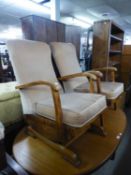 TWO WOOD FRAMED FIRESIDE ARMCHAIRS, COVERED IN PALE GOLD VELVET, ONE ROCKING ON SLEDGE FEET