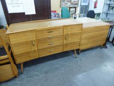 A SUTCLIFFE OF TODMORDEN TEAK DINING ROOM SUITE OF EIGHT PIECES, TO INCLUDE; A DROP LEAF DINING