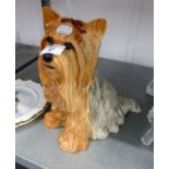 A LARGE BESWICK MODEL OF A SEATED TERRIER