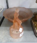 A PINK FROSTED GLASS TABLE CENTRE BOWL WITH MATCHING FEMALE FIGURE FLOWER BRICK