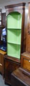 A MAHOGANY FLOOR STANDING DOUBLE CORNER CUPBOARD WITH OPEN SHELVES, OVER A CUPBOARD BASE