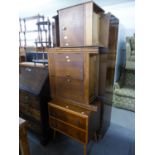 AN OAK SMALL CUPBOARD WITH TWO DOORS AND DRAWERS ABOVE, 2?3? WIDE AND END UMBRELLA STAND AND A