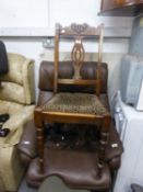 A CARVED MAHOGANY SINGLE CHAIR AND A WICKER CHAIR (2)